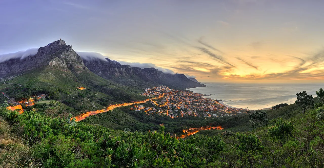 Table Mountain, the Twelve Apostles and Camps Bay at sunset from Kloof Nek