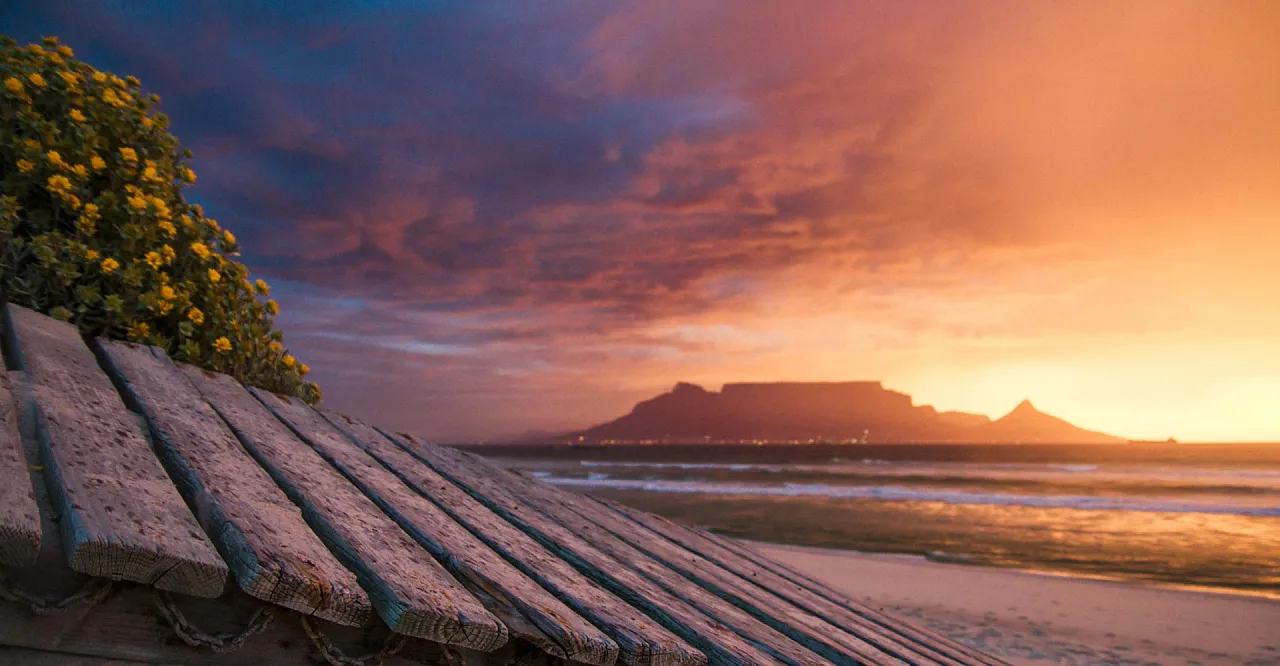 Table Mountain at sunset, seen across Table Bay from Bloubergstrand
